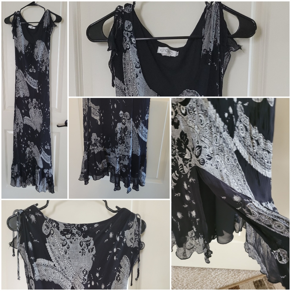 A sophisticated black & gray maxi dress, featuring a casual floral design Size 1